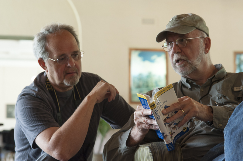 Larry Page, Gil Nelson discussing bird sightings